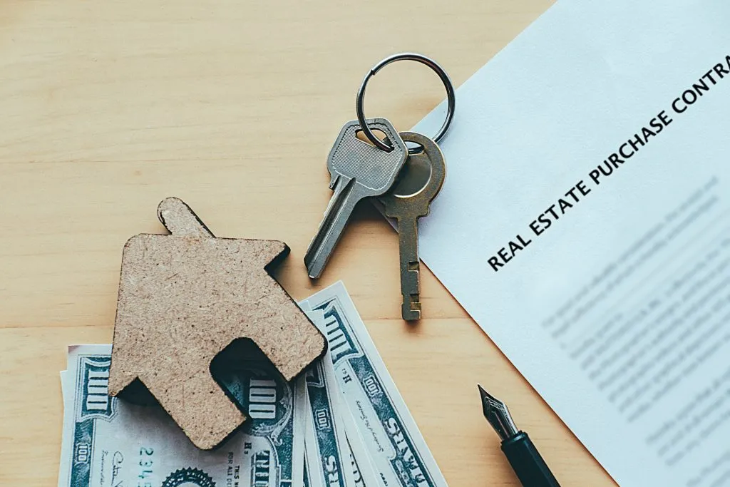 Keys and documents representing a property investment